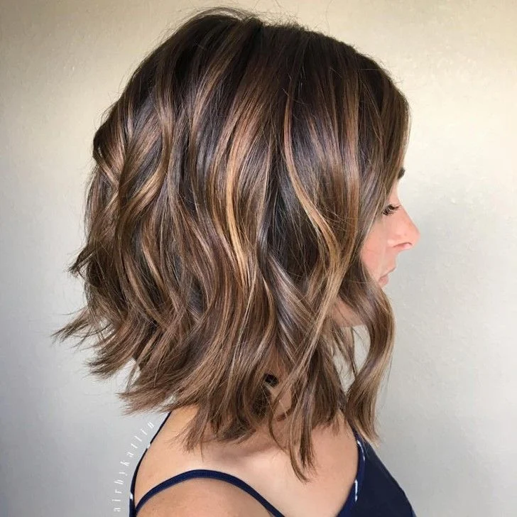 Pretty Brown Bob with highlights that are sun-kissed