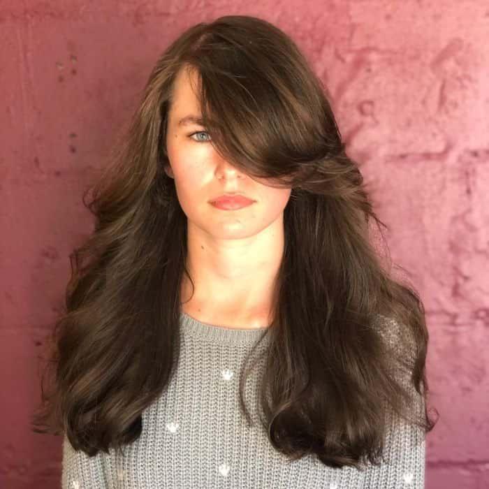 Mid Length Layers With Side Part for Round Face