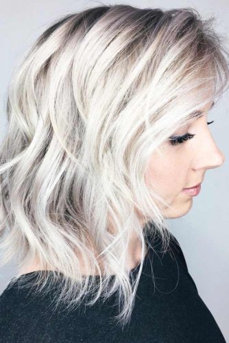 Blonde Hairstyle With Flirty Side Swept Bangs #mediumhairstyles #hairstyles #mediumlengthhairstyles #bangs