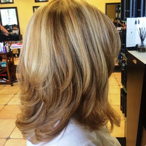 Medium Length Haircut for Women over 50 with some Overlapping Layers