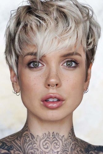 Silver Pixie Cut with Long Bangs #pixiecut #longpixie #shorthaircuts #blondehair