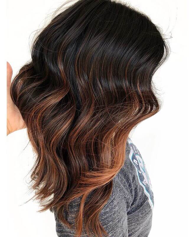 Warmly Toned Waves Of Dark Brown Hair