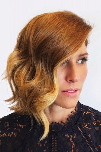 Wavy Asymmetrical Medium Bob With Strawberry Blonde Balayage #bobhaircuts #haircuts #asymmetricalbob #longbob #wavyhair