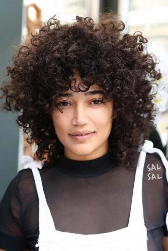 Curly Shag Hairstyle #shaghairstyles #shaghaircuts #mediumlength #hairstyles #curlyhair