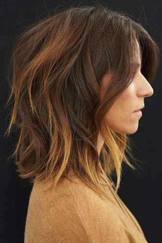 Feathered Brunette Shag With Long Side Bangs #mediumhair #bangs #shaggy