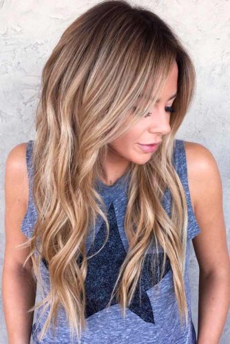 Long Layered Wavy Haircut with Cute Bangs