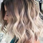 middle-parted-wavy-medium-hairstyles-mediumlength