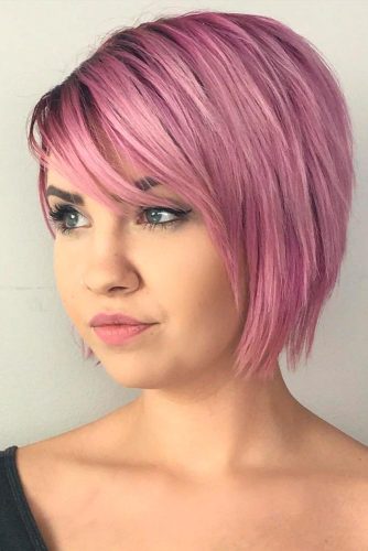 Pink Inverted Bob With Slide Bangs #pinkhair #stylishhaircuts