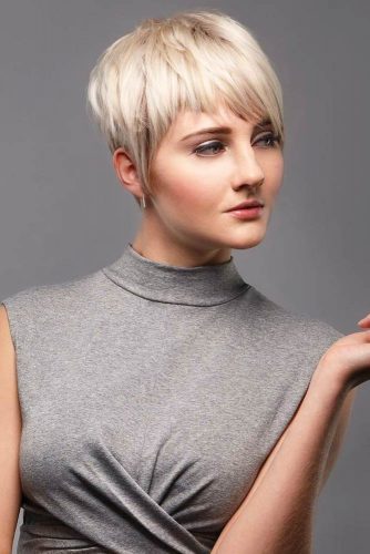 Short Straight Pixie Hairstyle With Asymmetrical Bangs #pixiecut #haircuts #shortpixie #blondehair