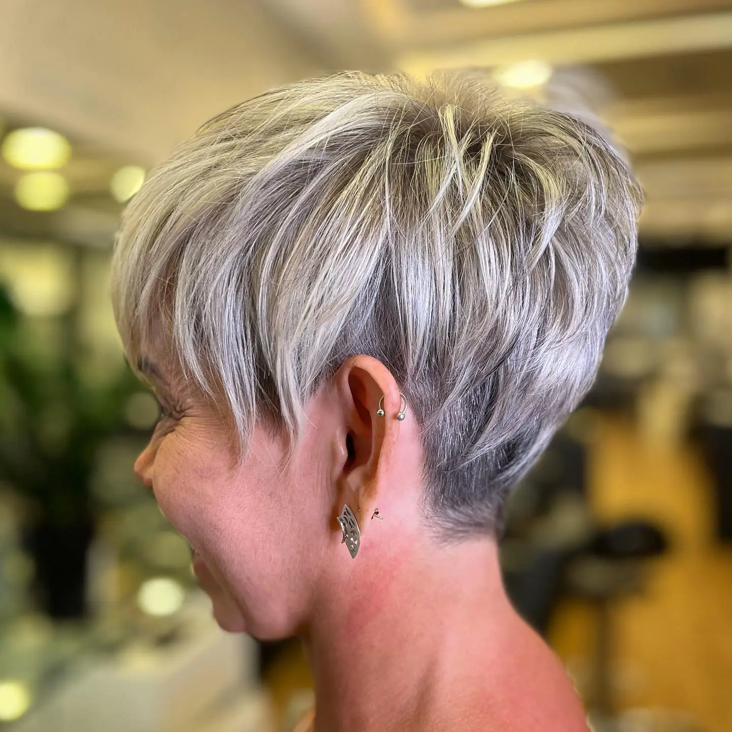 sassy-textured-pixie-for-over-50-with-closely-clipped-nape-undercut