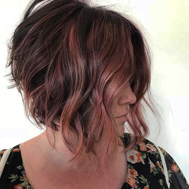 Bob Haircut with Layers and Red Highlights