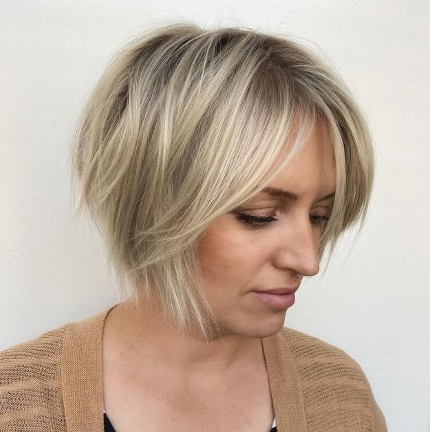 Long Side-Swept Feathered Fringe with a Short Bob