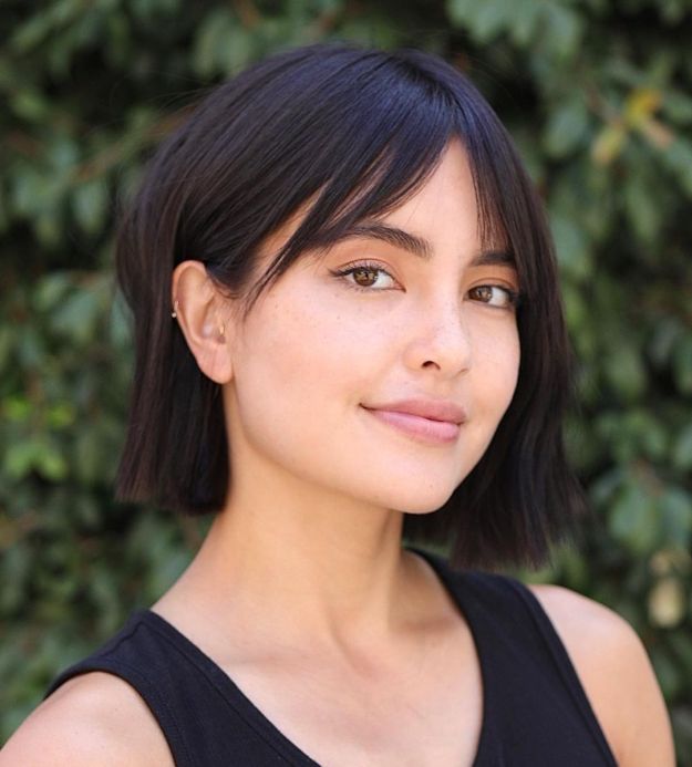 Side-Swept Feathered Bangs with Middle Parting