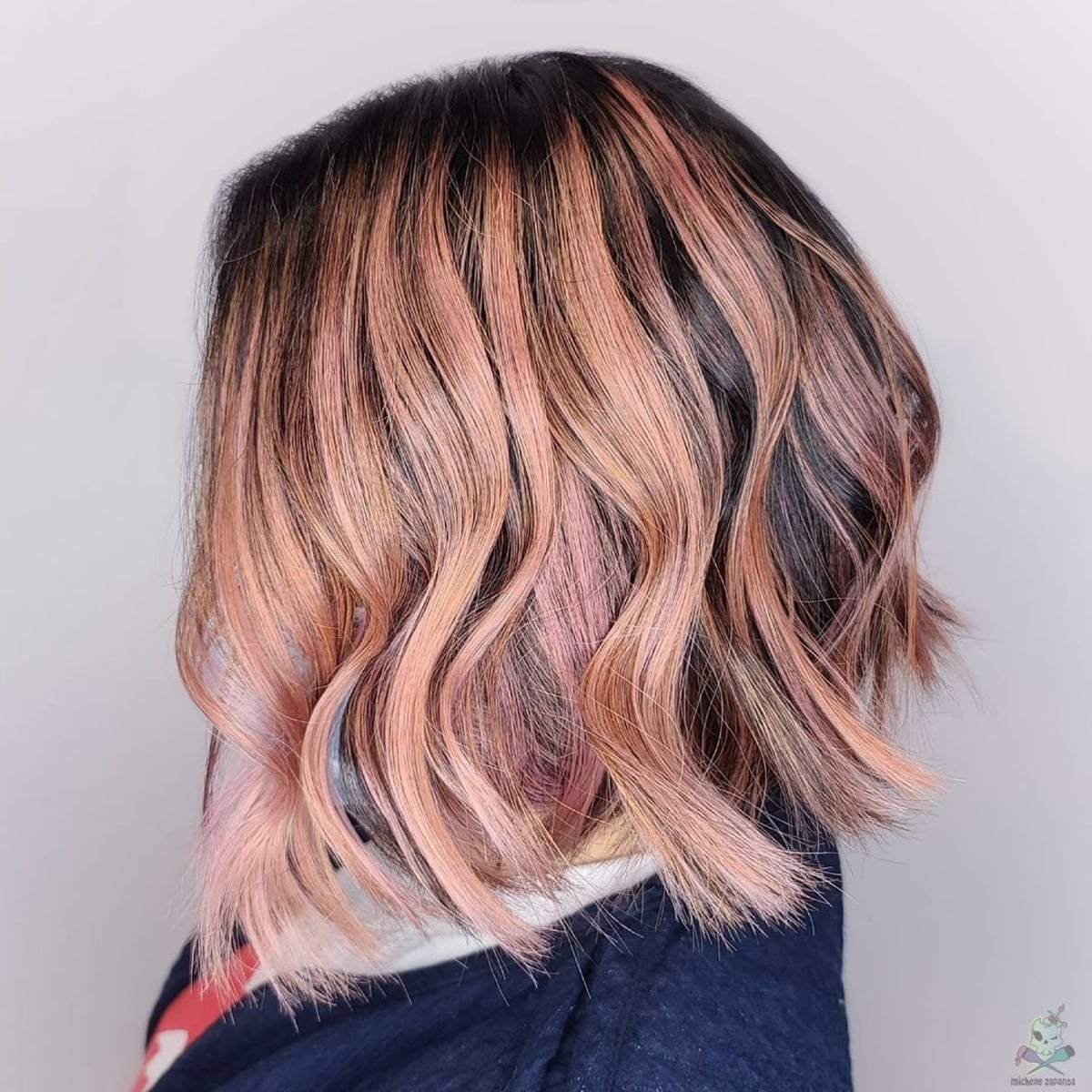 A blushing angled bob haircut for thicker hair