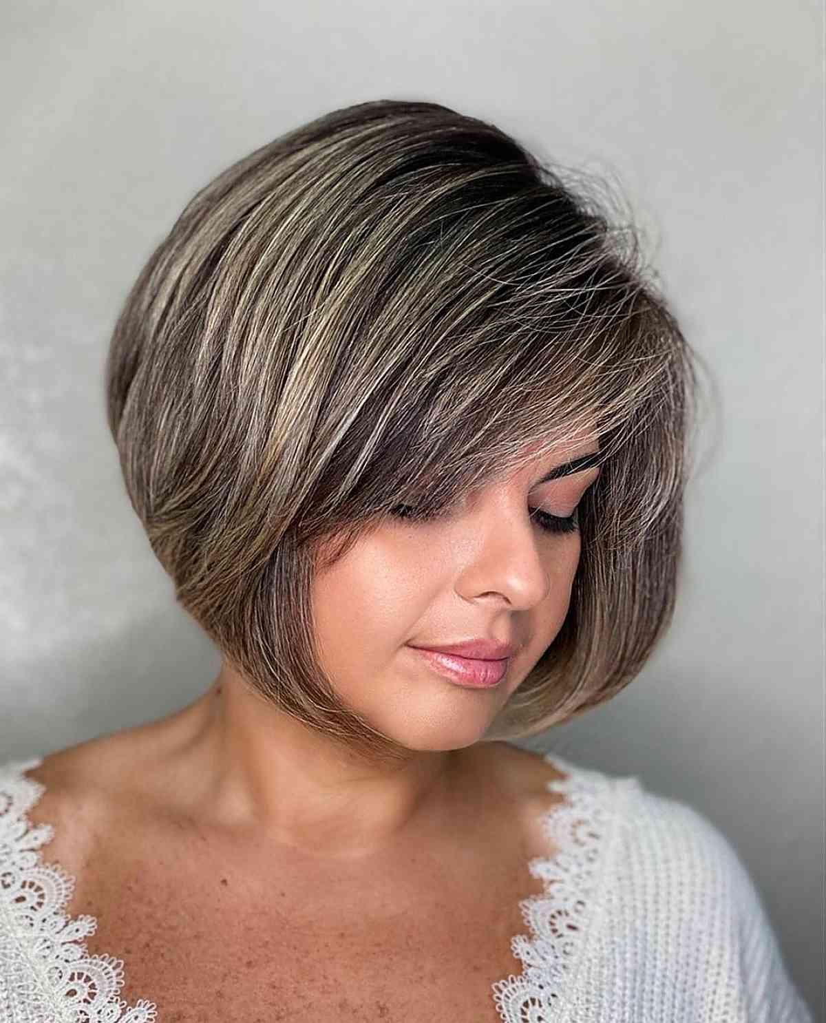 a-line bob hairstyle with side bangs