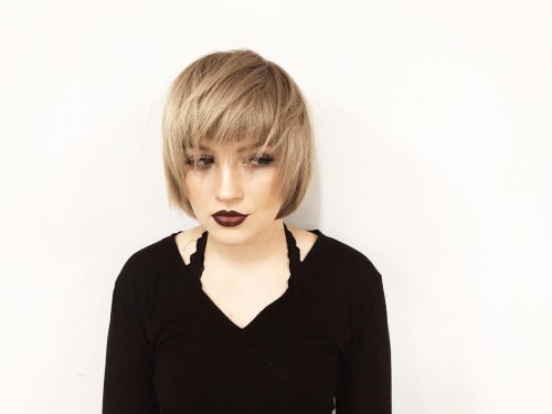 A short layered graduated bob haircut with bangs