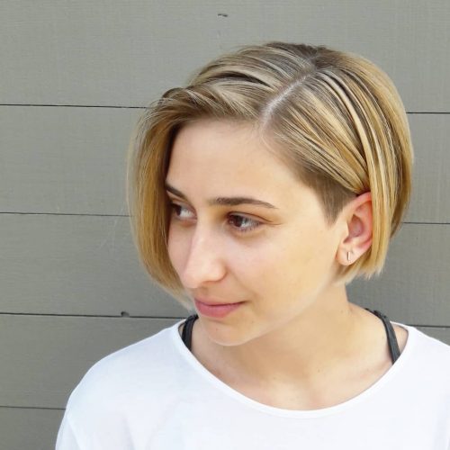 A short undercut bob haircut with blonde hair