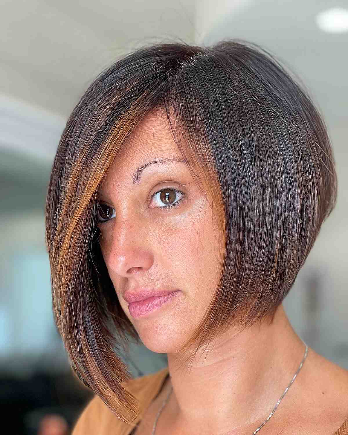 Adorable chin-length asymmetrical bob