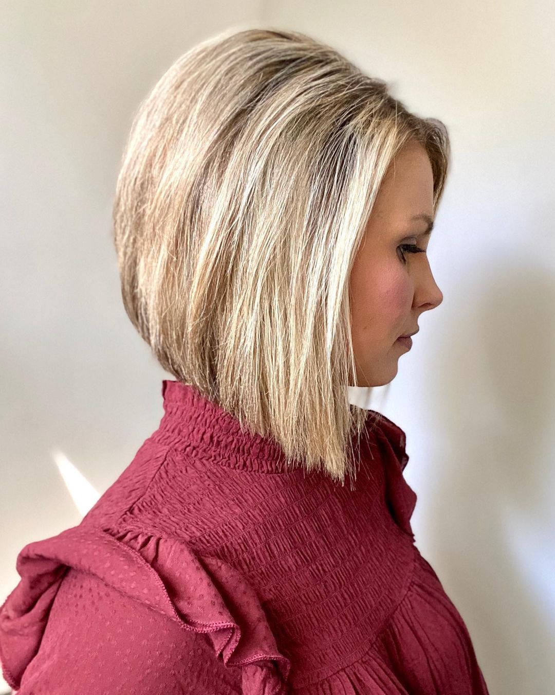 Layered inverted bob for a round face shape