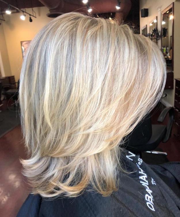 Above-The-Shoulder Feathered Blonde Haircut