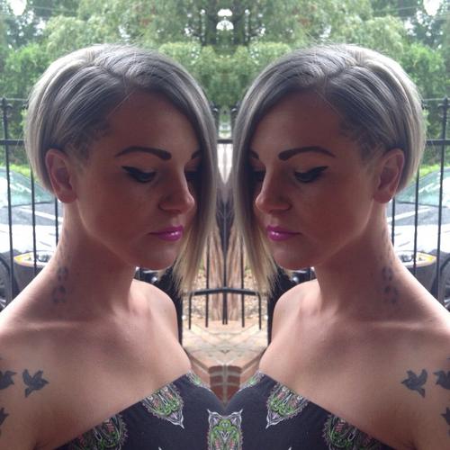 Asymmetric gray bob with temple undercut