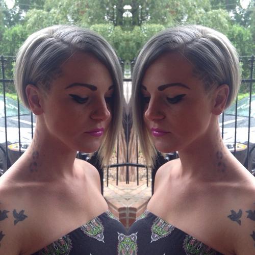 Asymmetric gray bob with temple undercut