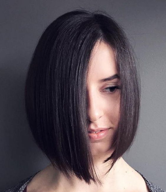 asymmetrical angled brunette bob