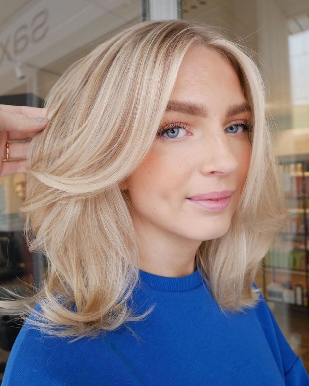Buttery Blonde Layered Hairstyle