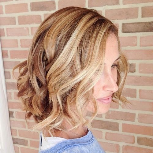 caramel short bob with blonde highlights