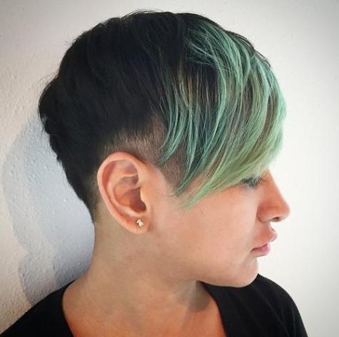 extra short black pixie with green bangs