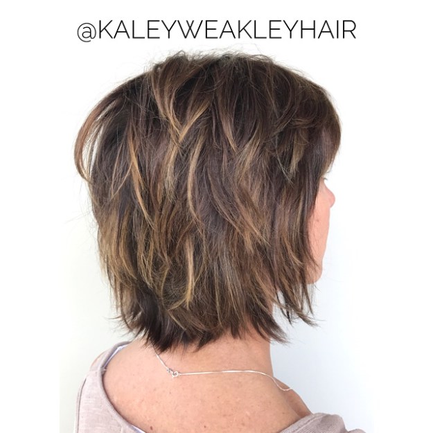 Feathered Bob With Bangs And Highlights
