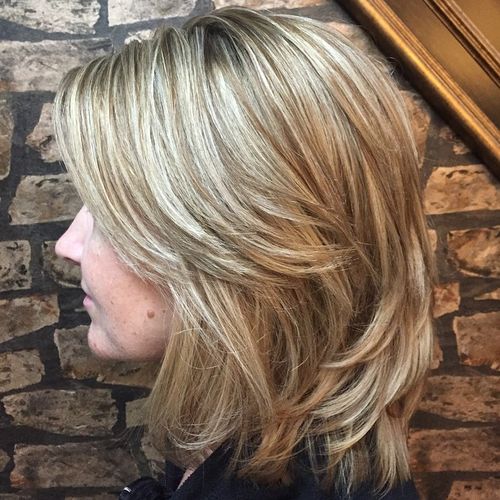 layered brown blonde hairstyle
