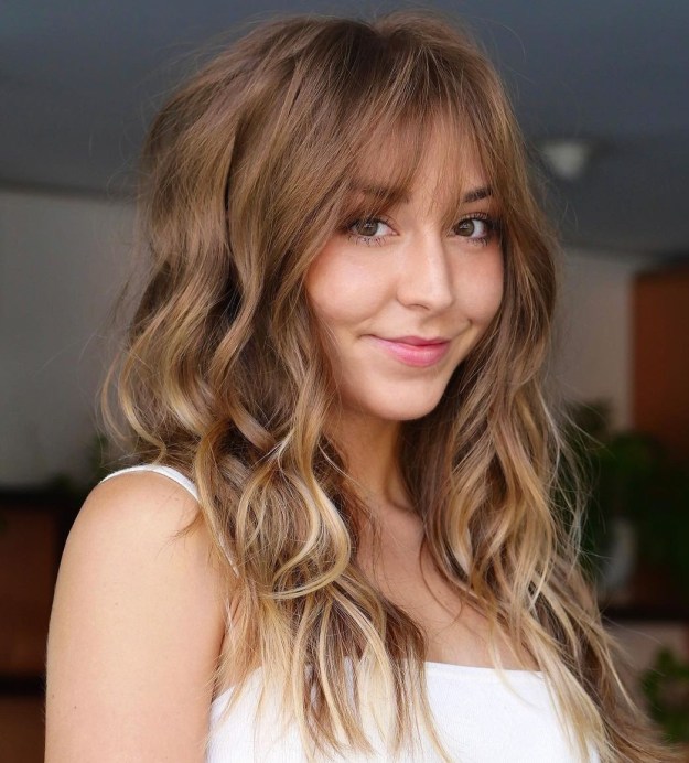 Light Brown Hair with Soft Curls and Bangs