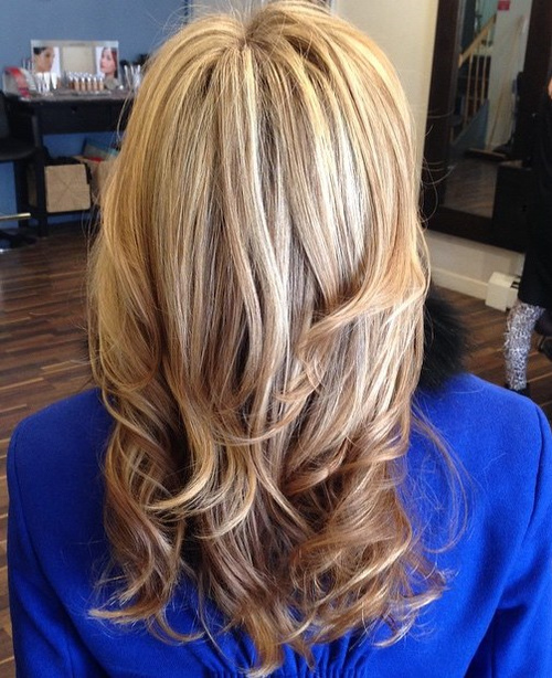 light brown layered hair with blonde highlights