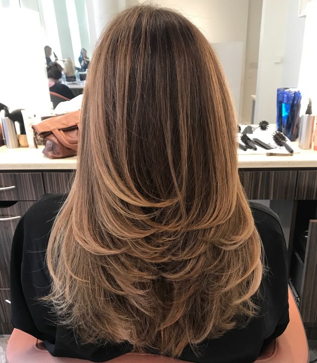 Long Haircut With Feathered Layers And Highlights
