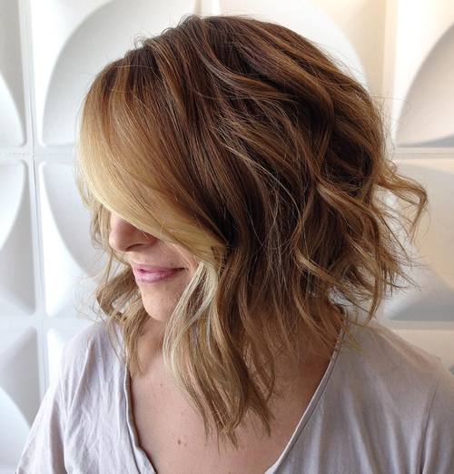 long wavy asymmetrical bob with balayage