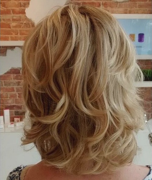 medium blonde layered hairstyle