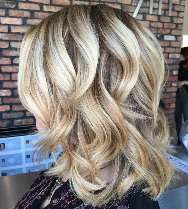 Medium Curly Blonde Hairstyle