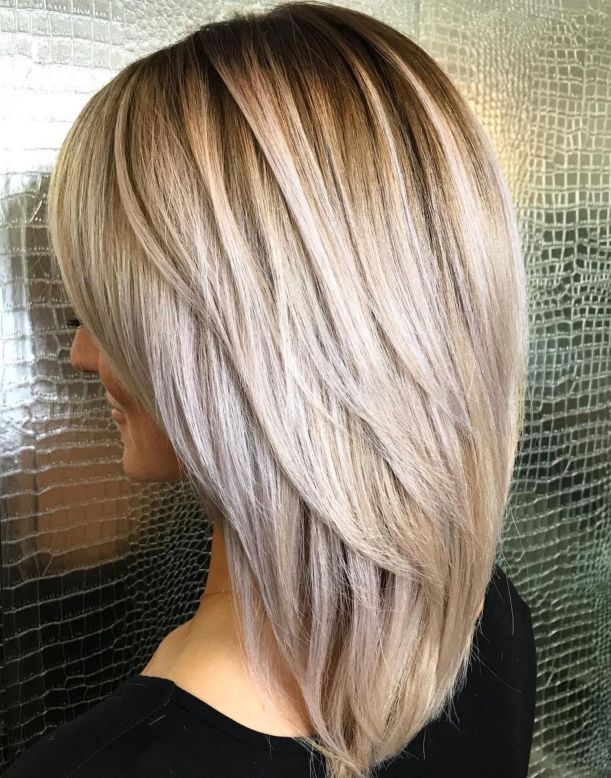 Medium Hairstyle With V-Cut Layers