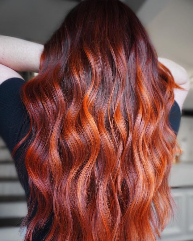 Orange Highlights in Dark Red Hair