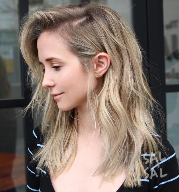 Sandy Blonde Layered Hairstyle