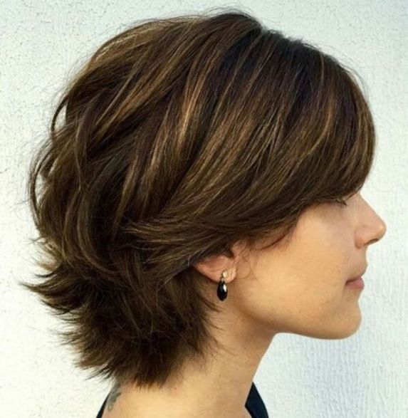 short-to-medium razored haircut for women