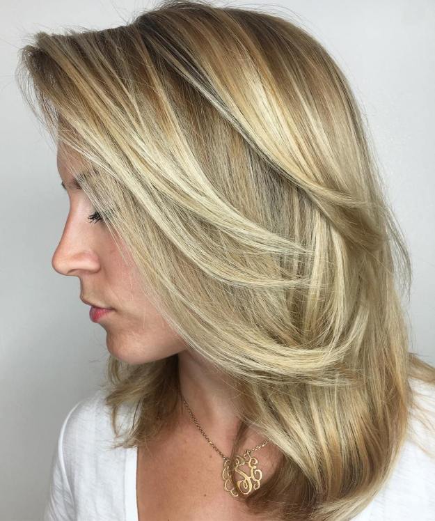 Side-Parted Medium Blonde Balayage Hair