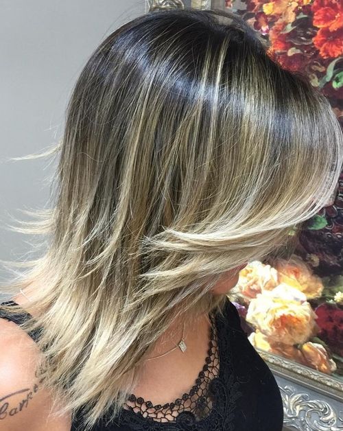 straight layered hairstyle with ombre highlights