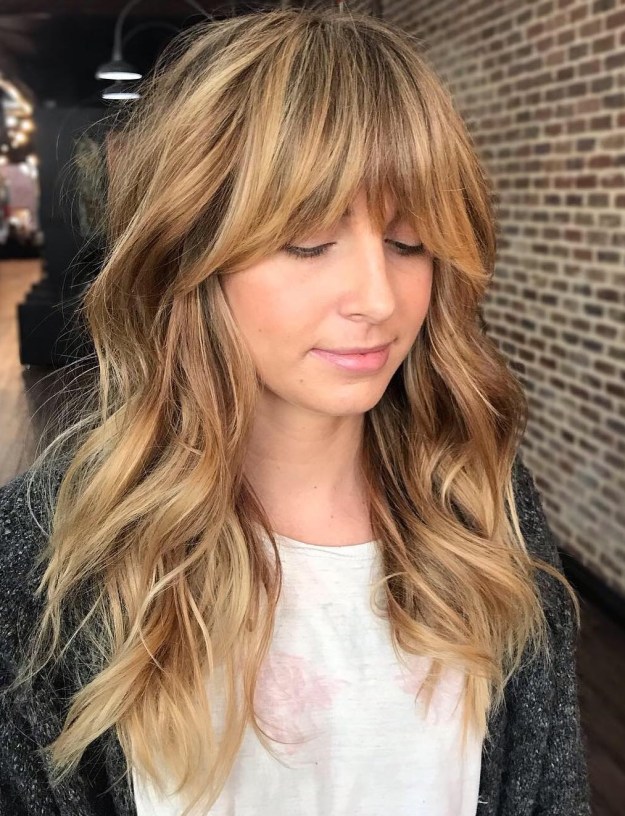 Wavy Shaggy Hairstyle With Bangs