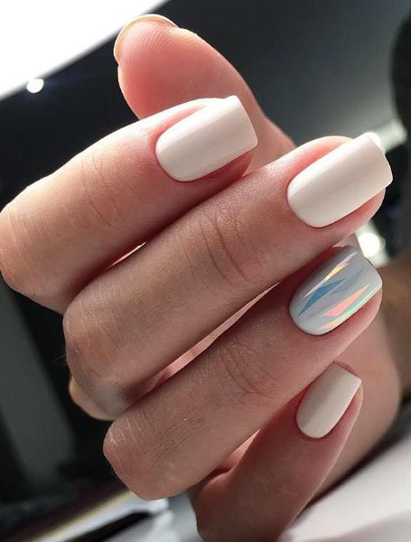 17. White Nails With Feature Ring Finger