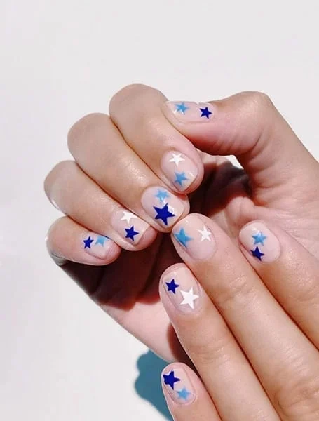 Nude-Nails-with-Blue-and-White-Stars