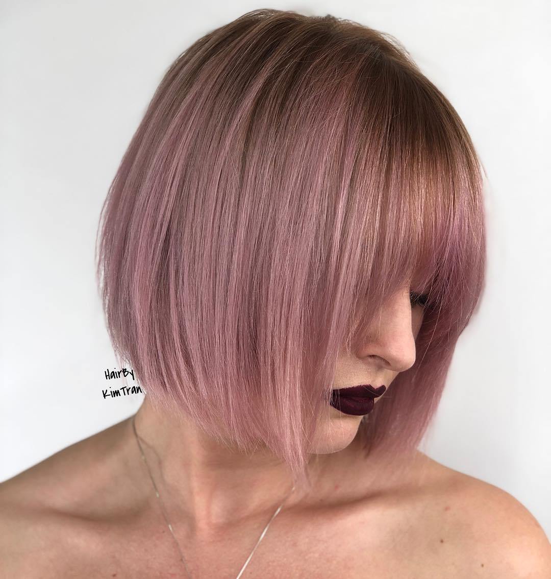 Sleek Pastel Pink Bob With Bangs