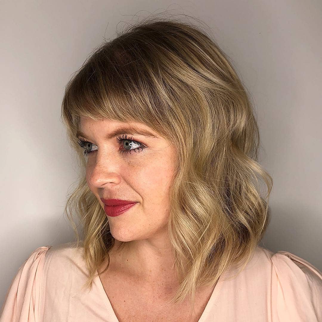 Medium Length With Side Swept Bangs