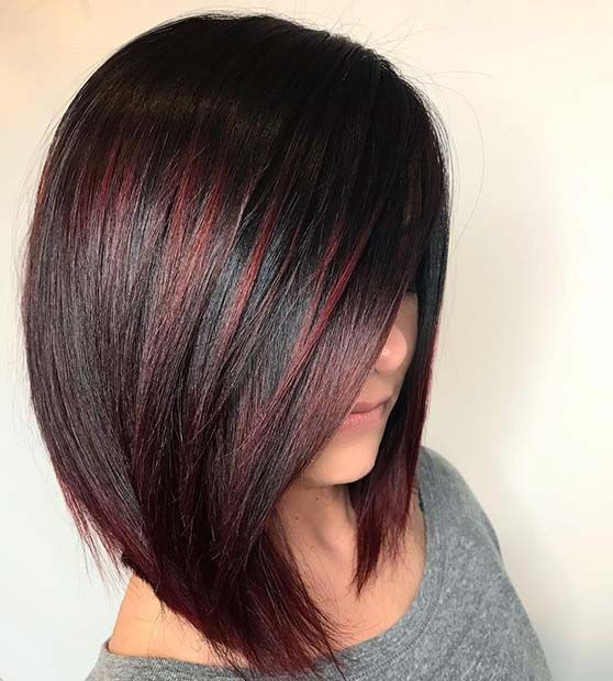 A-Line Bob Hairstyle With Dark Red Highlights And Bangs 3